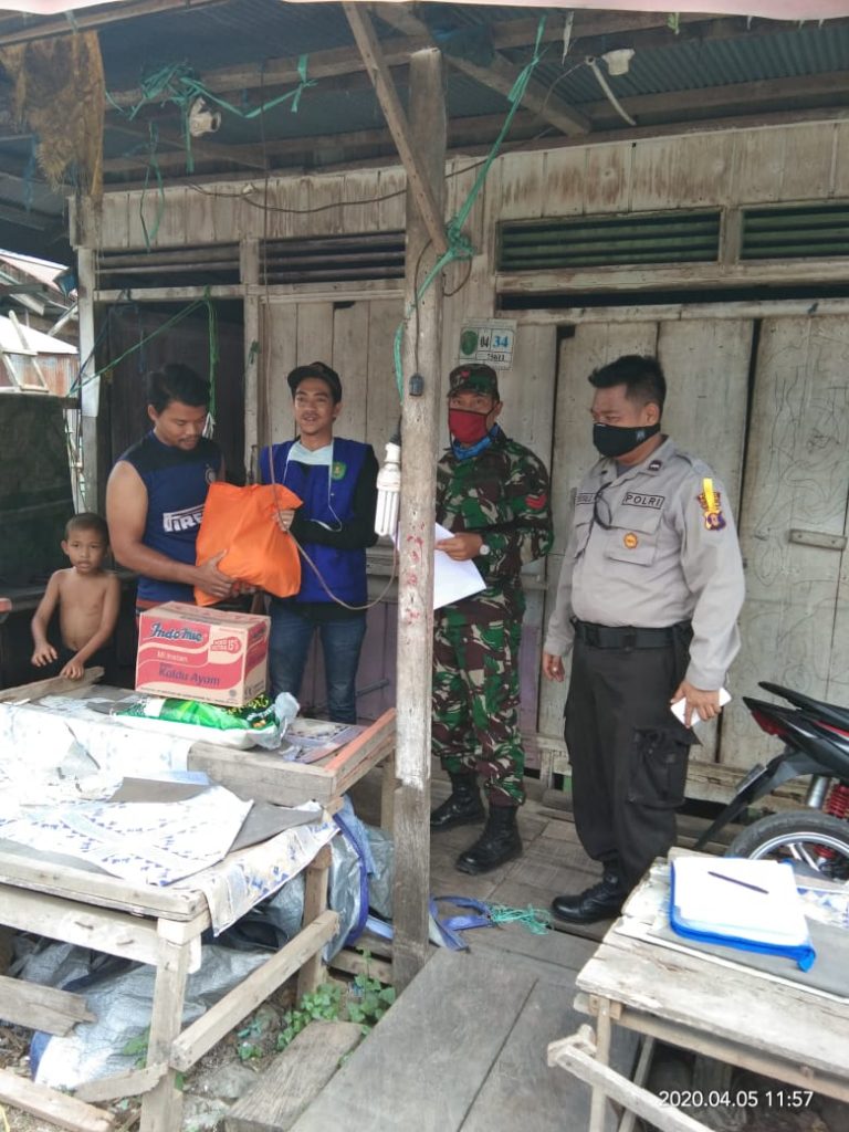 Pandemi Covid-19, Polres Kutim Kawal Pendistribusian Sembako dari Pemerintah Kepada Masyarakat 3 1
