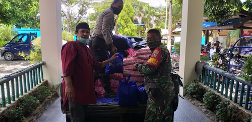 Jamin Keamanan dan Kelancaran Penyaluran Bansos, TNI-Polri di Balikpapan Kompak Lakukan Pengawalan 1 9