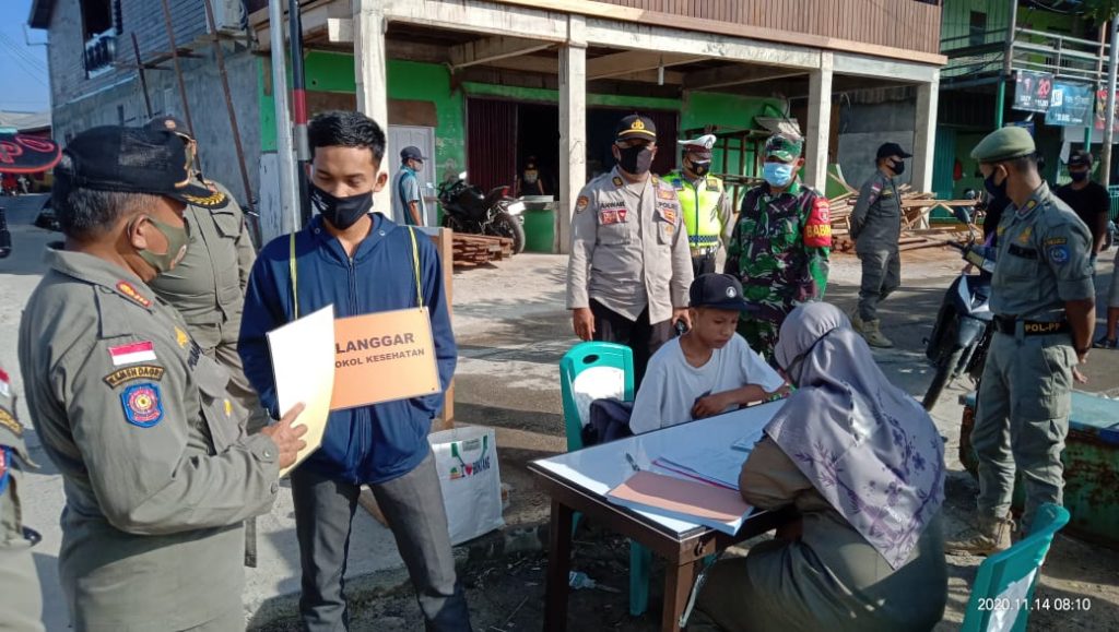 Cegah Penyebaran Covid-19, Personel Gabungan di Bontang Gencar Laksanakan Operasi Yustisi 5 2
