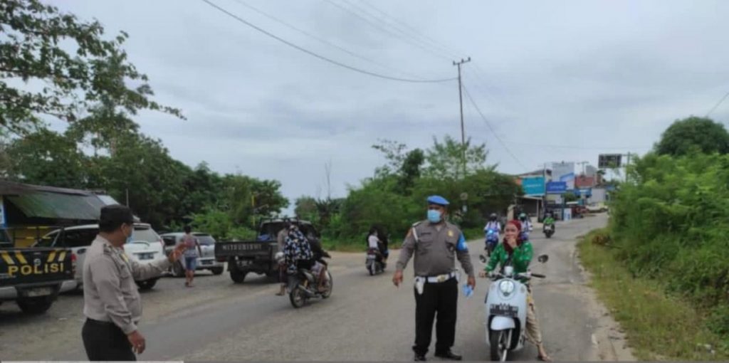 Antisipasi Penyebaran Covid-19, Polsek Muara Badak Laksanakan Operasi Yustisi 9 1