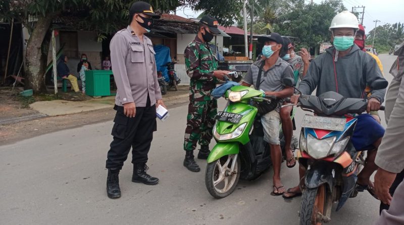 Gencarkan Operasi Yustisi, Polsek Marang Kayu Bersama Aparat Gabungan Bagikan Masker kepada Masyarakat 1 10