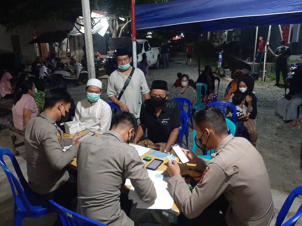 Agar Mudik Nyaman, Polres Penajam Gelar Vaksinasi Malam Hari di Dua Lokasi WhatsApp Image 2022 04 07 at 16.41.10